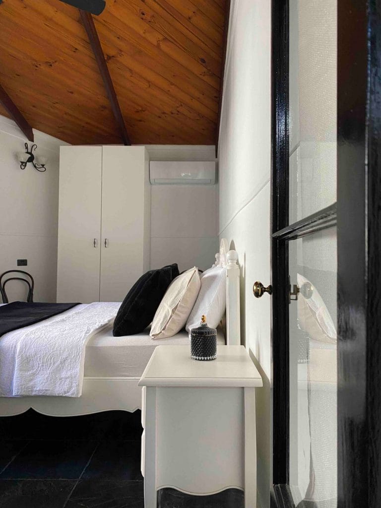 A queen bedroom with air conditioning