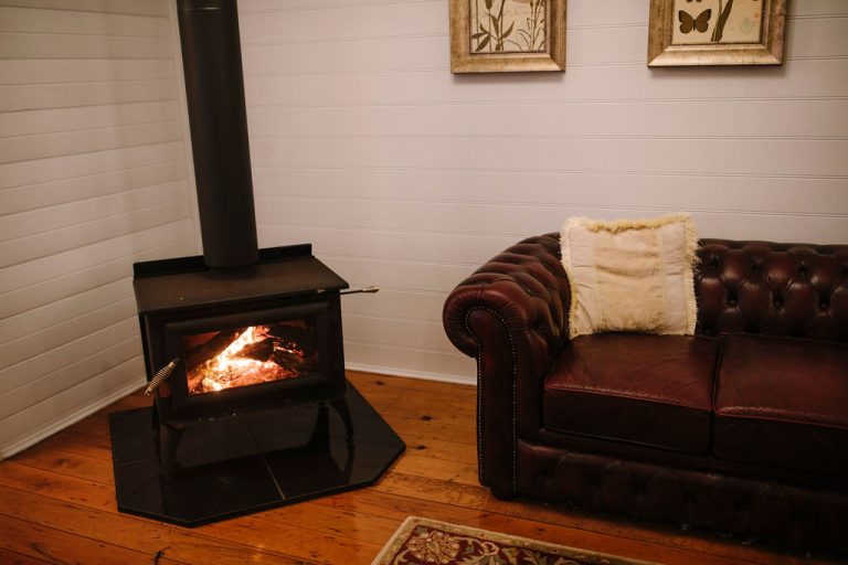 The Dovecote Cottage lounge with the wood fire lit